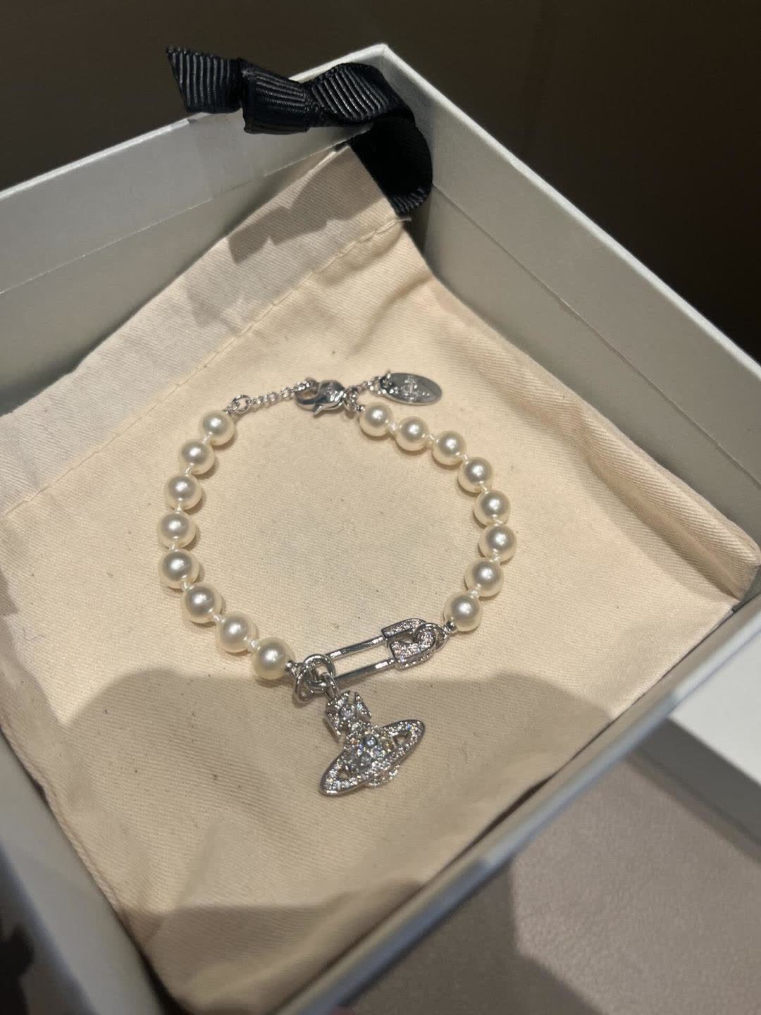 Vivienne Westwood Pearl Bracelet with Orb Charm
